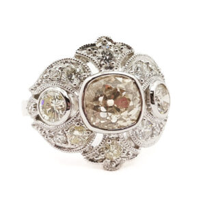The gold and main diamond was take from a pre-loved ring and turned into this stunning ring.