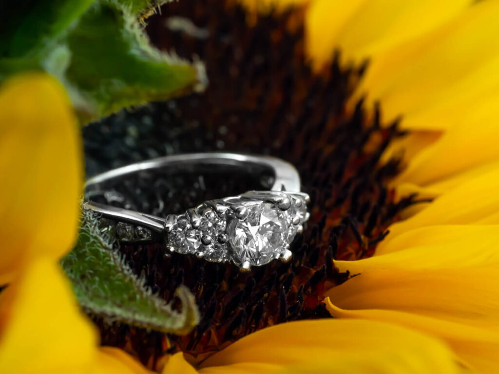 A white gold trilogy diamond engagement ring.
