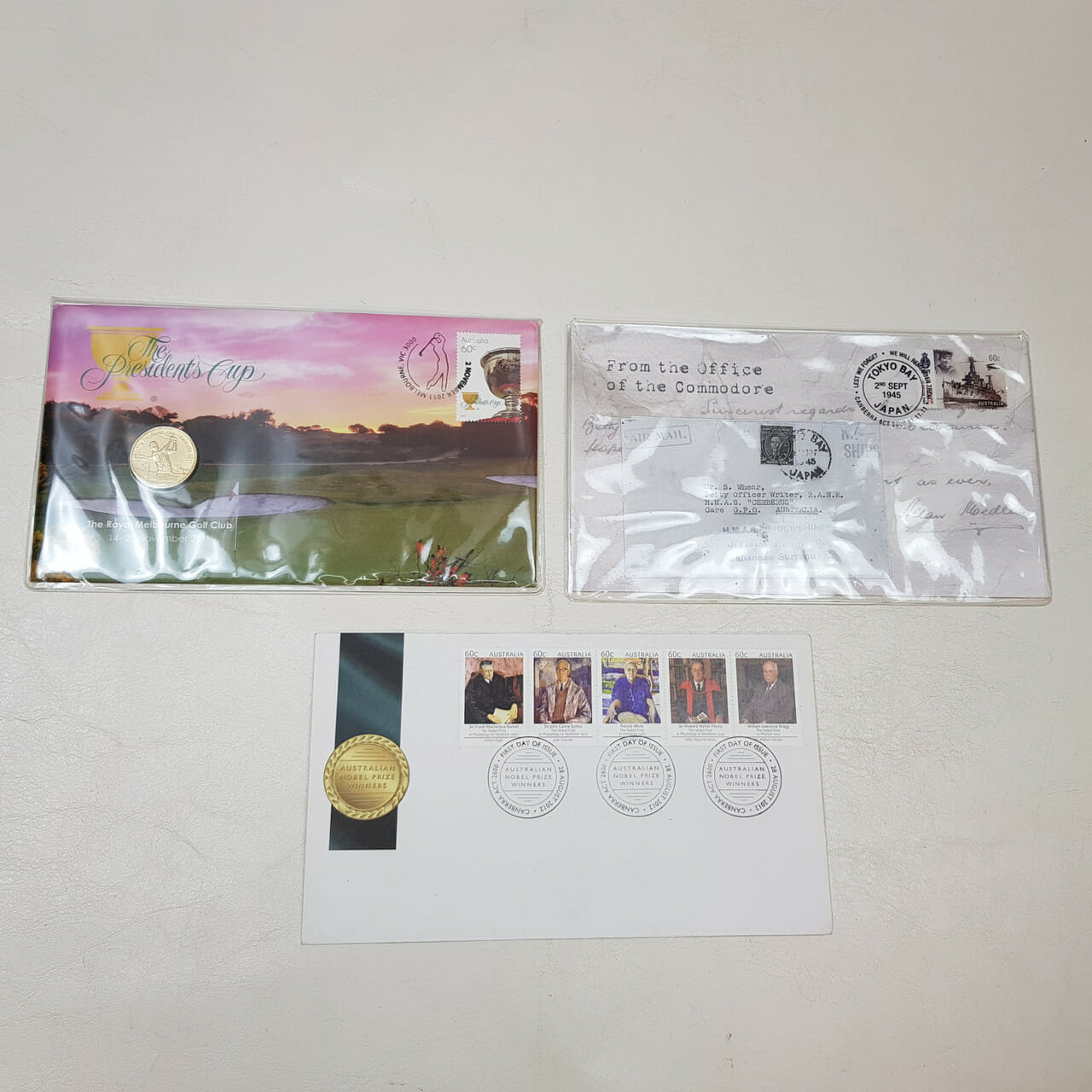 AUSTRALIA POST STAMPED ENVELOPES & PRESIDENTS CUP GOLF COINS #54295