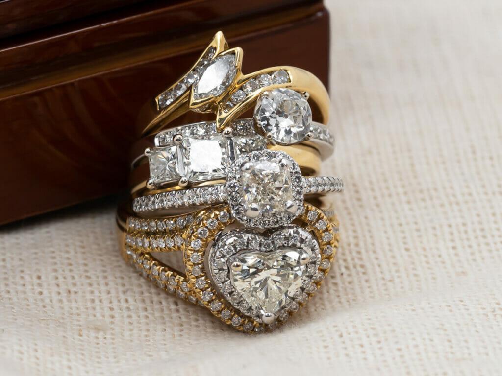 Diamonds stacked together showing the four C's of Diamonds.
